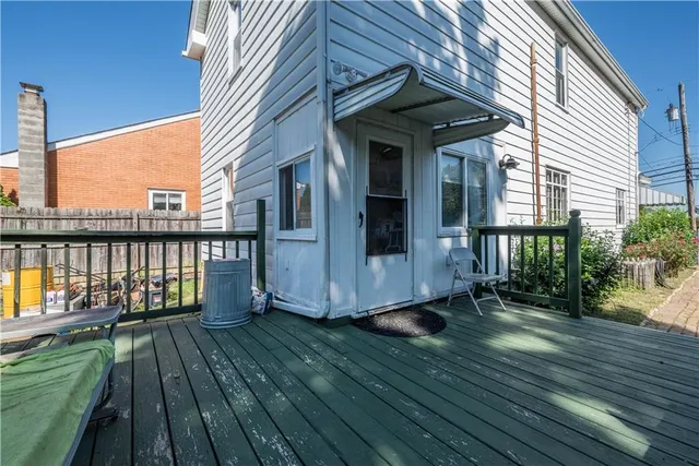 a backyard of a house with yard and entertaining space