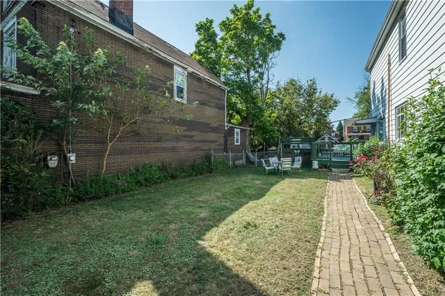 a house view with a garden space