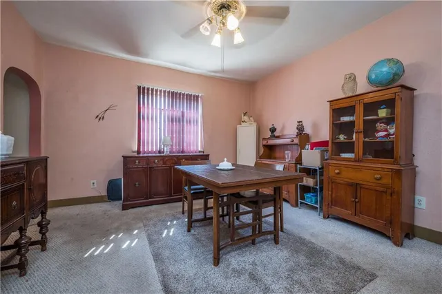 a view of a workspace with furniture