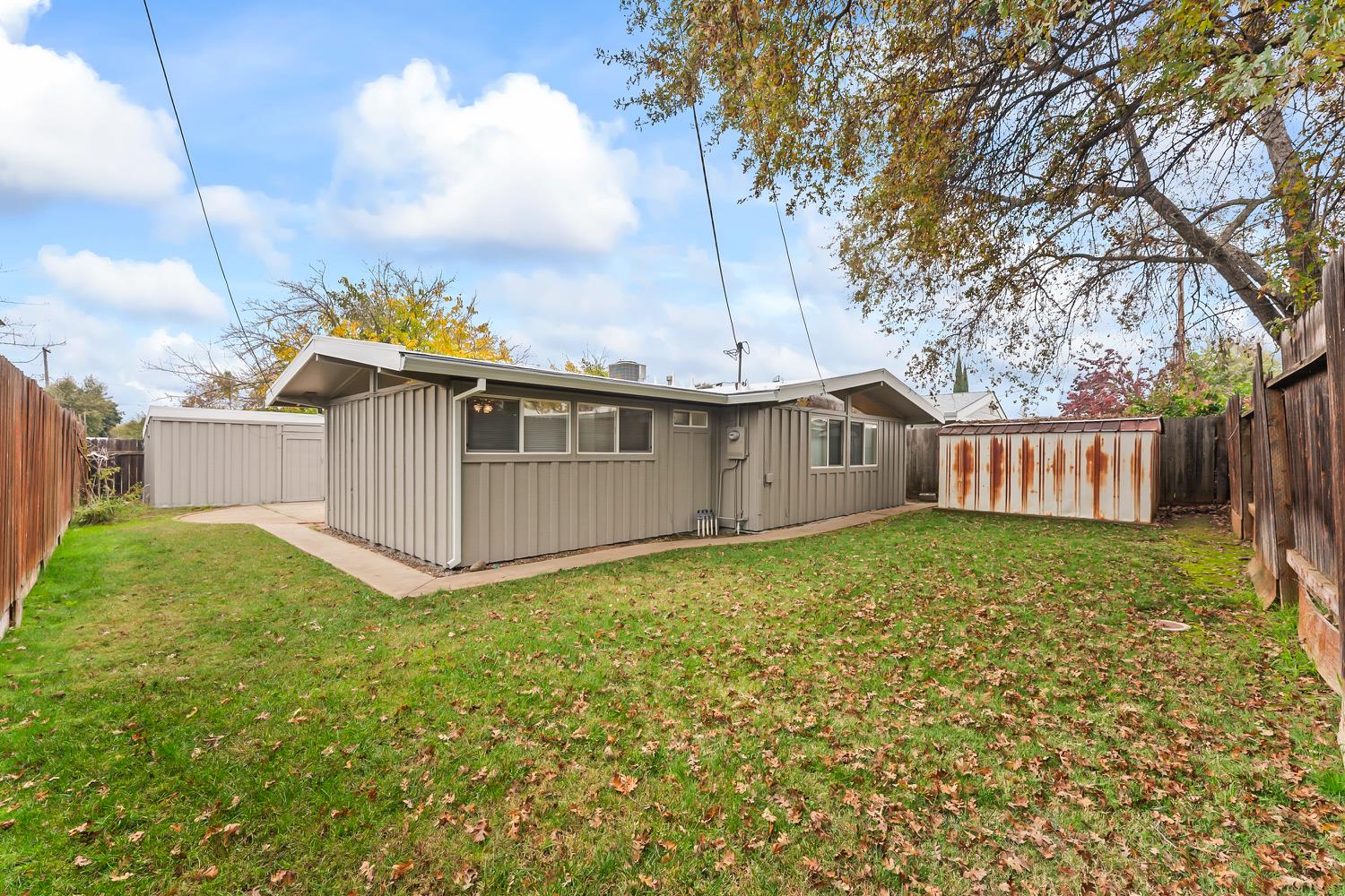 317 Brookwood Road Roseville, CA 95678 - Photo 32 of 36 a view of a house with backyard and garden
