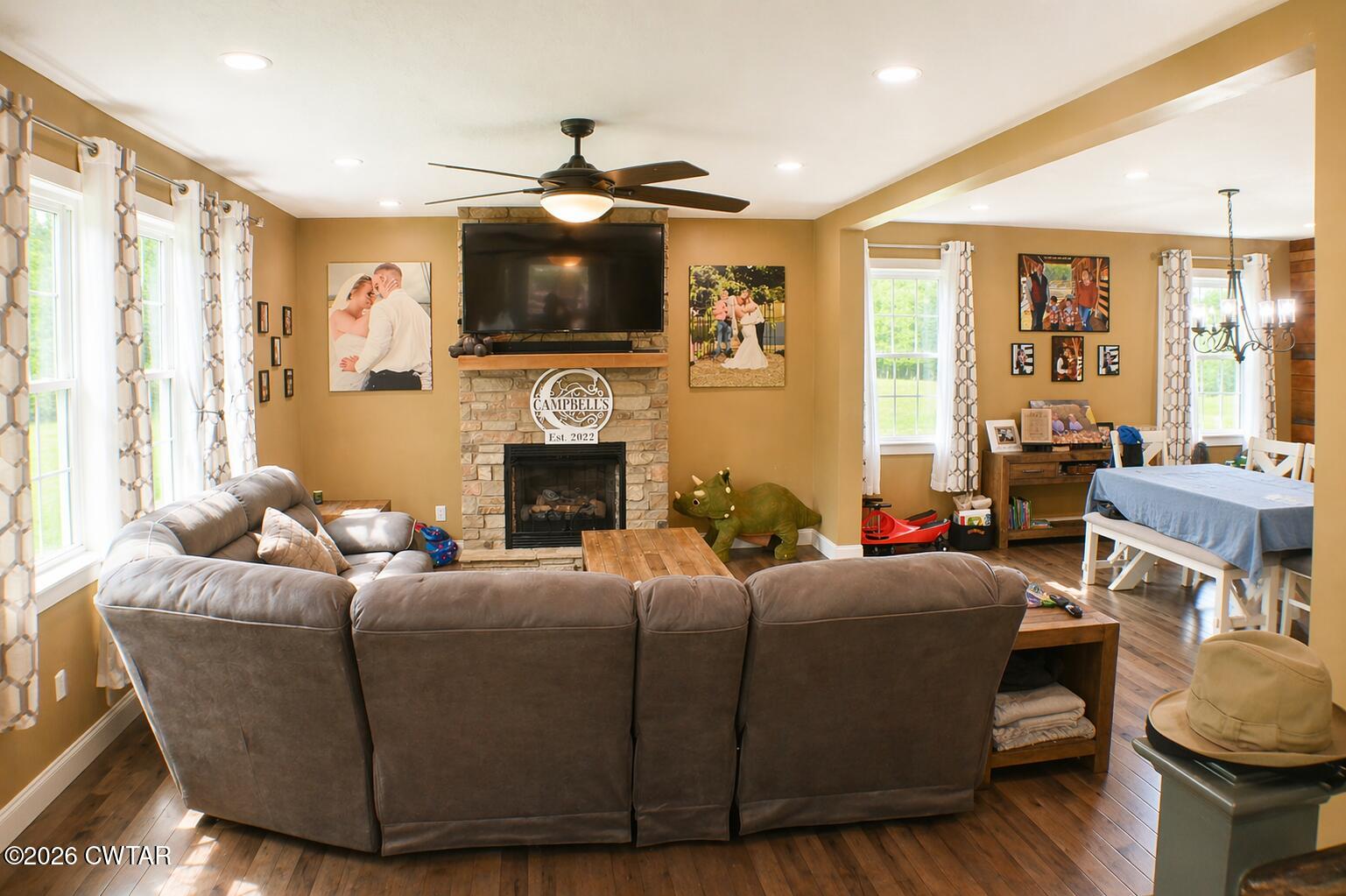648 Old Dyersburg Road Dyer, TN 38330 - Photo 2 of 20 a living room with fireplace furniture and a flat screen tv
