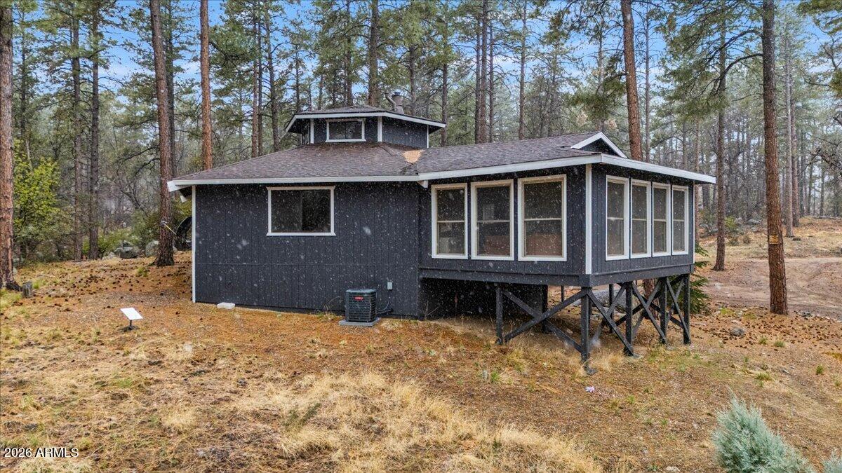 5979 Dearing Road Prescott, AZ 86305 - Photo 9 of 48 a front view of a house with a yard