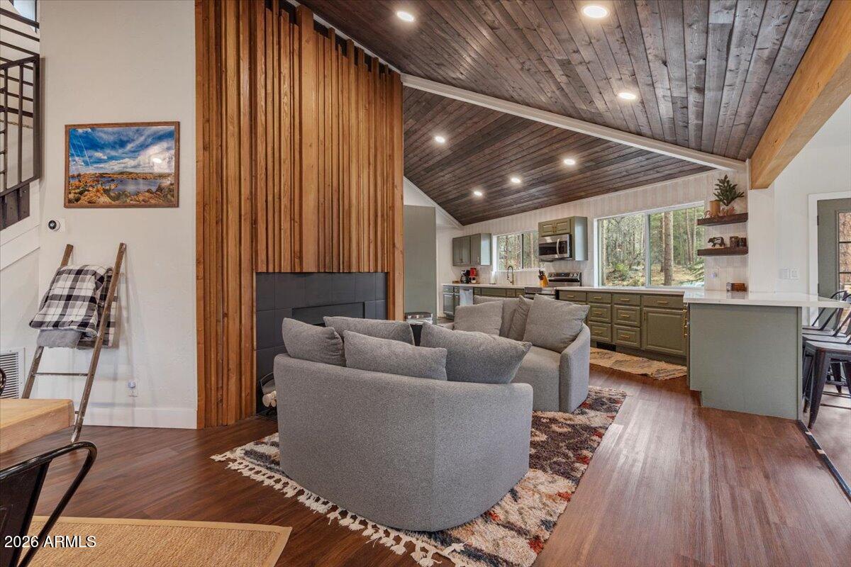 5979 Dearing Road Prescott, AZ 86305 - Photo 11 of 48 a living room with furniture and a wooden floor