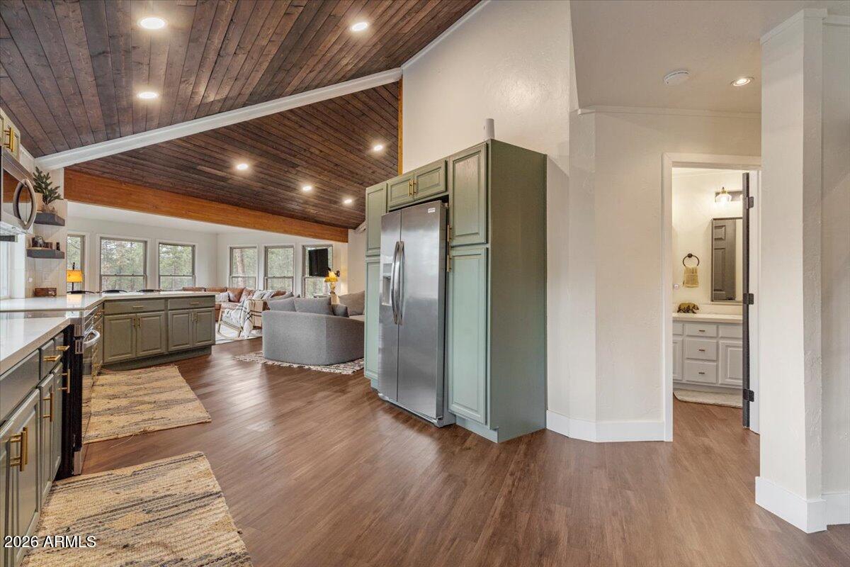5979 Dearing Road Prescott, AZ 86305 - Photo 24 of 48 a living room with stainless steel appliances kitchen island granite countertop furniture wooden floor and a view of kitchen