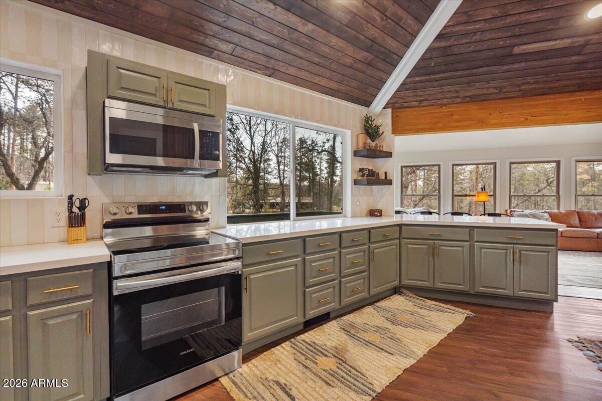 5979 Dearing Road Prescott, AZ 86305 - Photo 25 of 48 a kitchen with a stove sink and cabinets