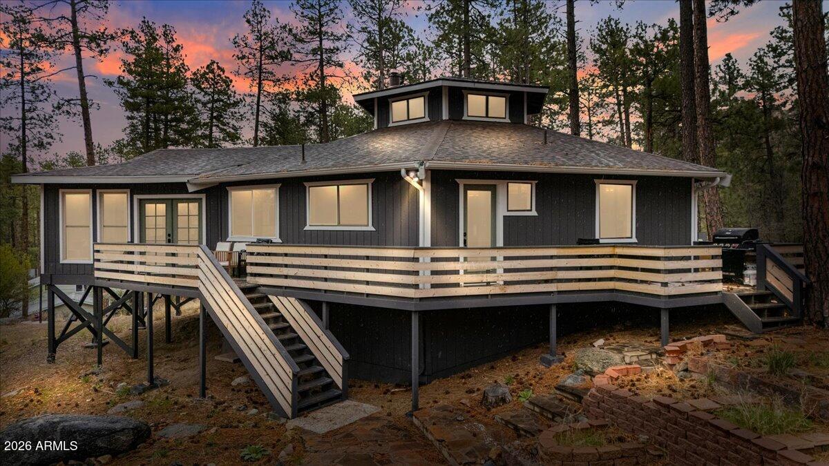 5979 Dearing Road Prescott, AZ 86305 - Photo 2 of 48 a front view of a house with a balcony and chairs