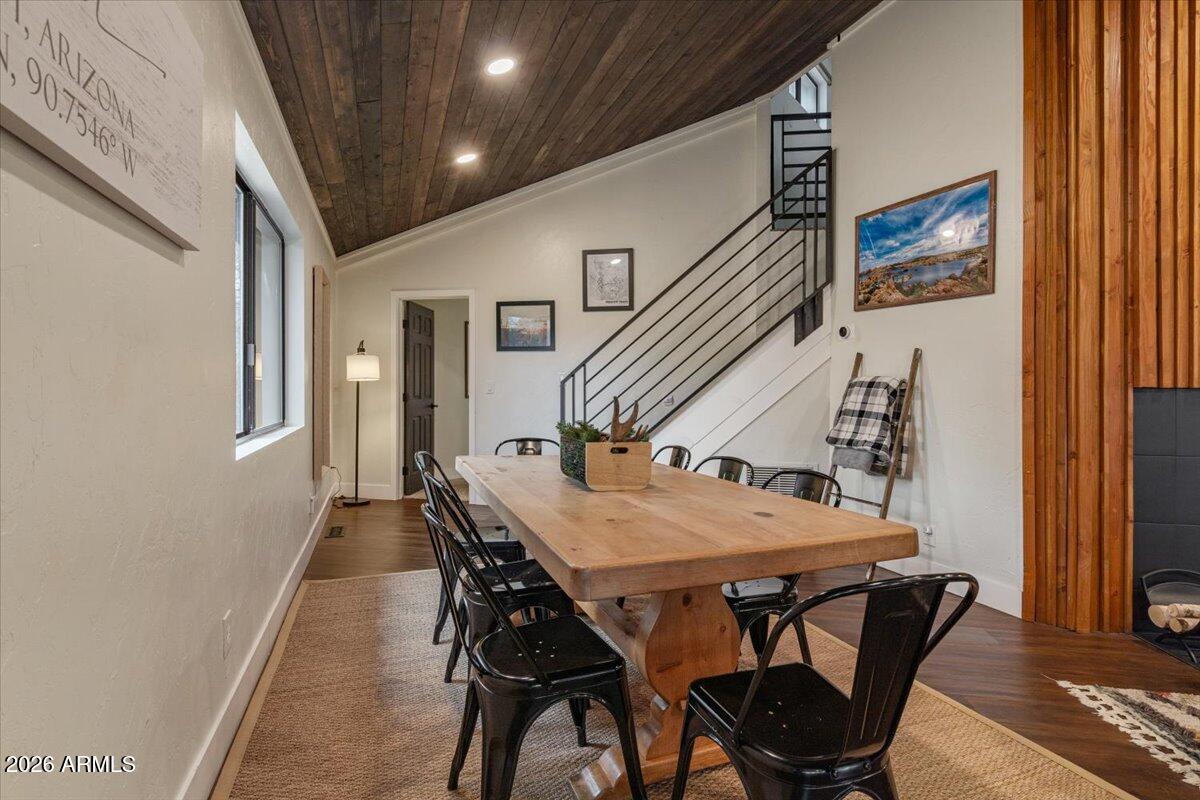 5979 Dearing Road Prescott, AZ 86305 - Photo 29 of 48 a dining room with furniture and wooden floor