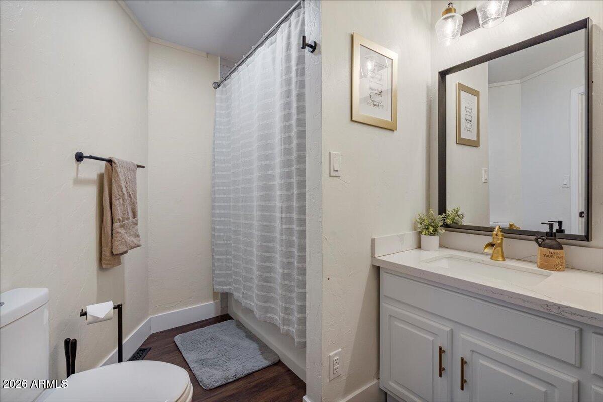 5979 Dearing Road Prescott, AZ 86305 - Photo 32 of 48 a bathroom with a sink a toilet and shower