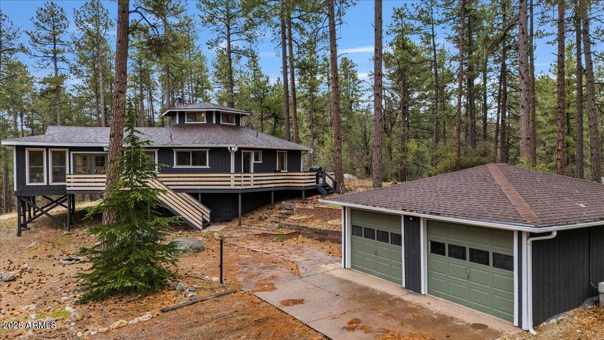 5979 Dearing Road Prescott, AZ 86305 - Photo 5 of 48 a aerial view of a house with a yard and trees
