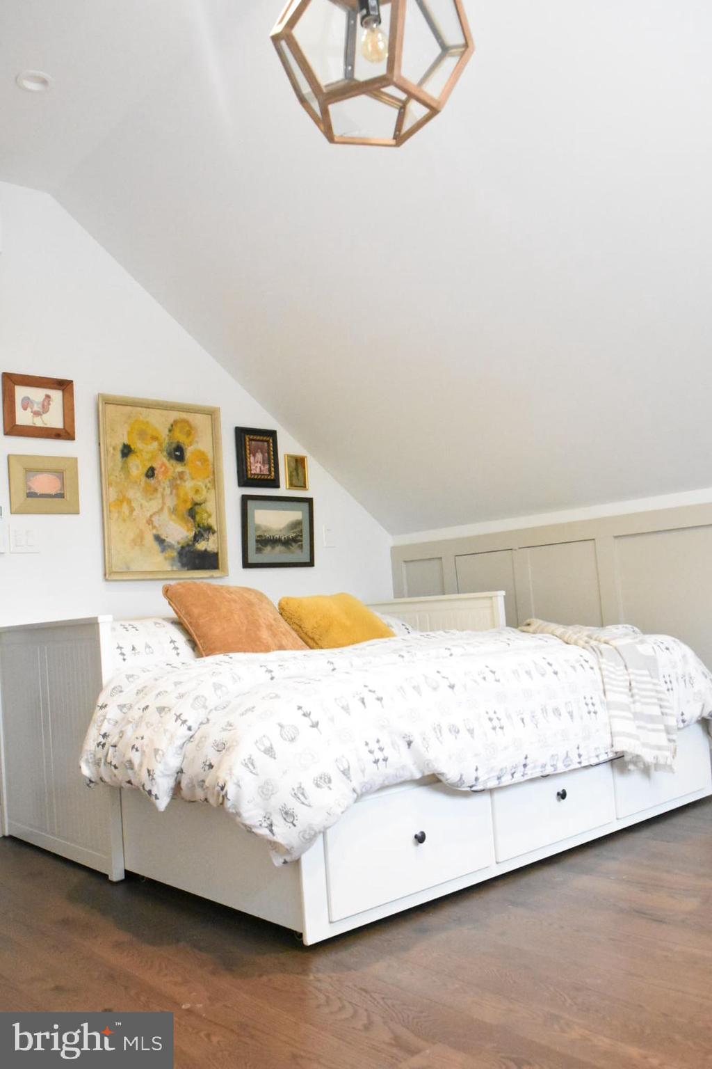 28 Delaware Avenue Ewing, NJ 08628 - Photo 11 of 46 a bedroom with a bed and lamp