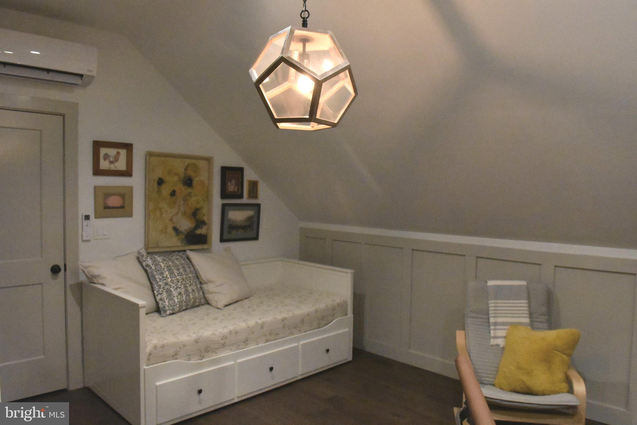 28 Delaware Avenue Ewing, NJ 08628 - Photo 17 of 46 a bedroom with a bed and chair