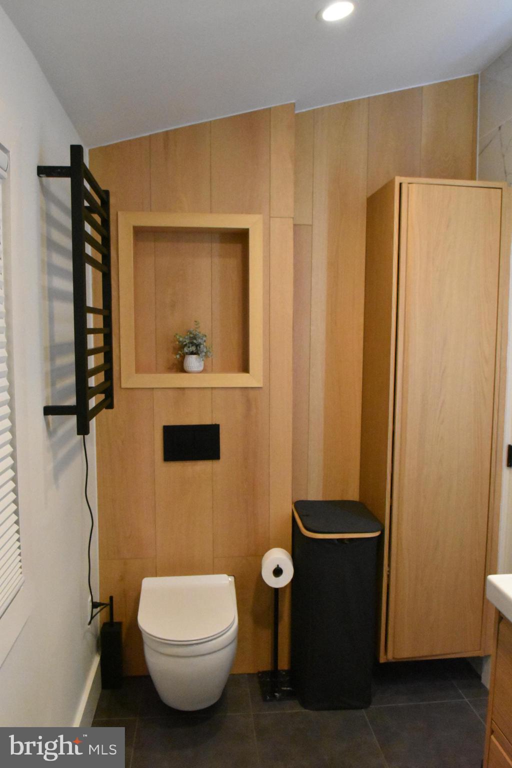 28 Delaware Avenue Ewing, NJ 08628 - Photo 22 of 46 a bathroom with a toilet and a shower