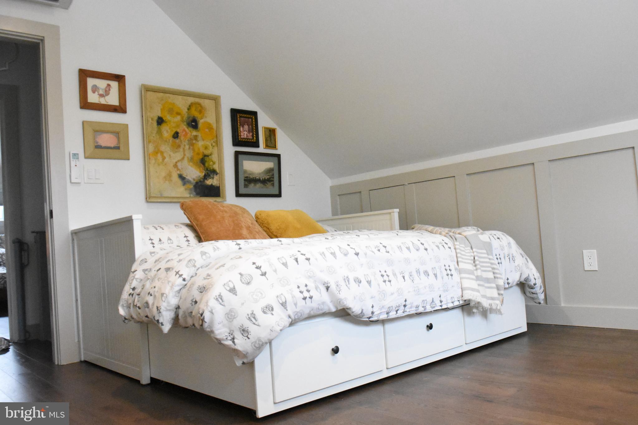 28 Delaware Avenue Ewing, NJ 08628 - Photo 24 of 46 a bedroom with a bed and a night stand