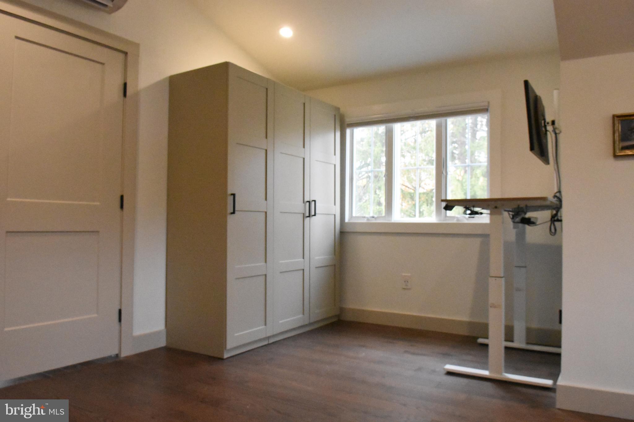 28 Delaware Avenue Ewing, NJ 08628 - Photo 29 of 46 a view of a storage & utility room with a window