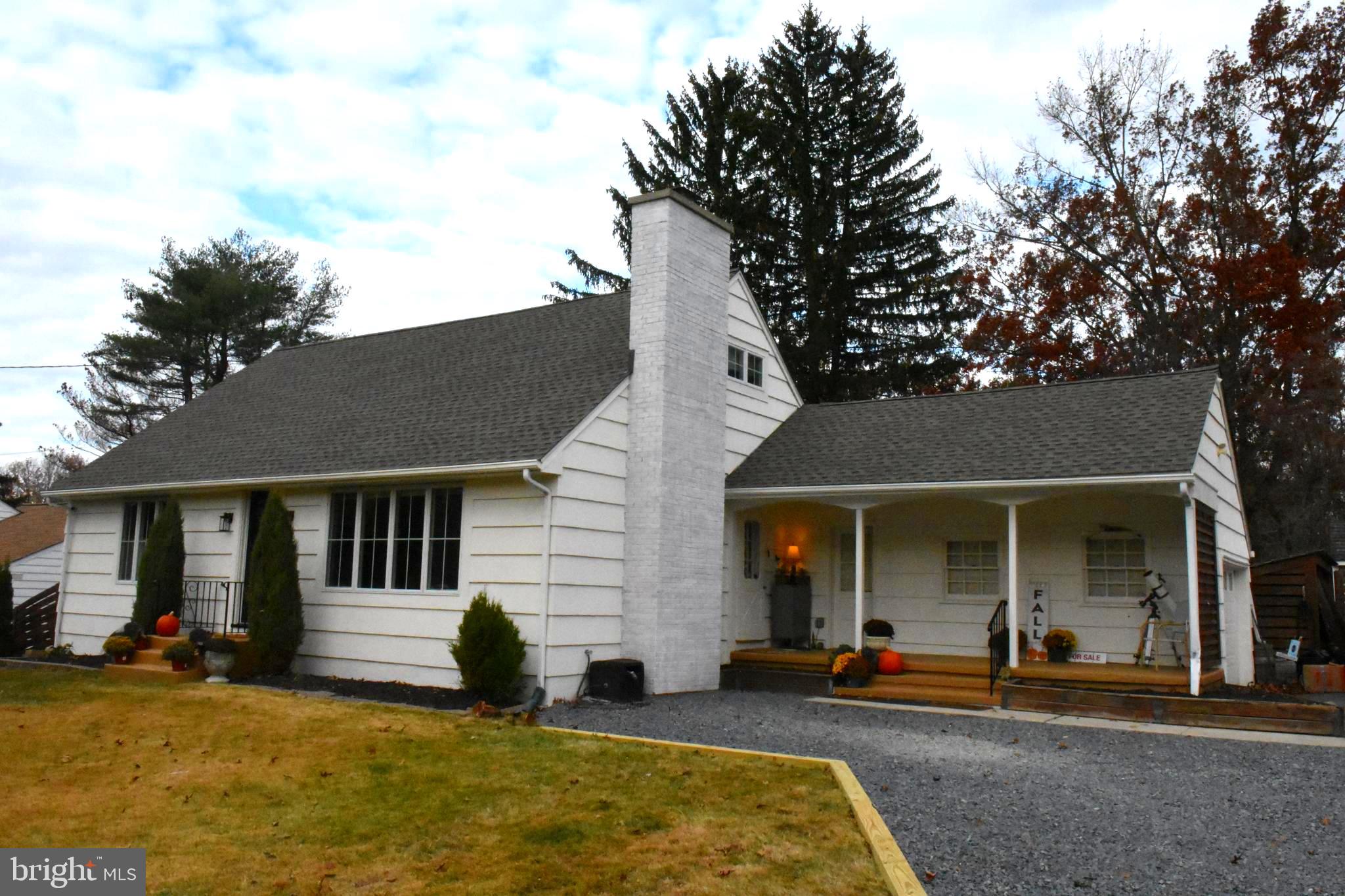 28 Delaware Avenue Ewing, NJ 08628 - Photo 41 of 46 a front view of a house with a patio