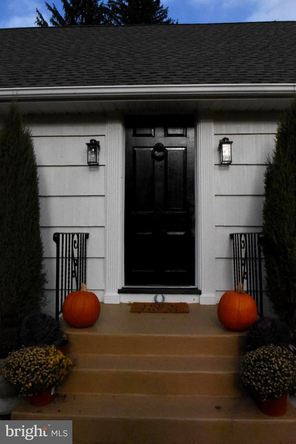 28 Delaware Avenue Ewing, NJ 08628 - Photo 45 of 46 a front view of a house with entryway