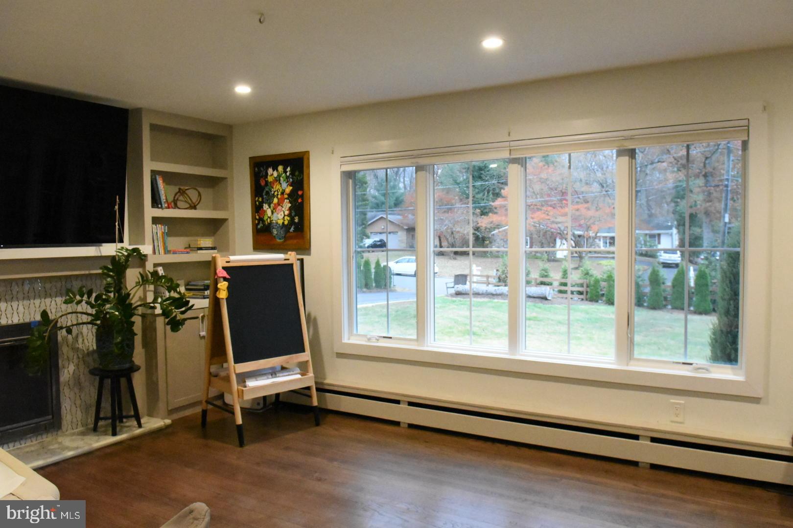 28 Delaware Avenue Ewing, NJ 08628 - Photo 9 of 46 a view of a workspace with furniture and a window
