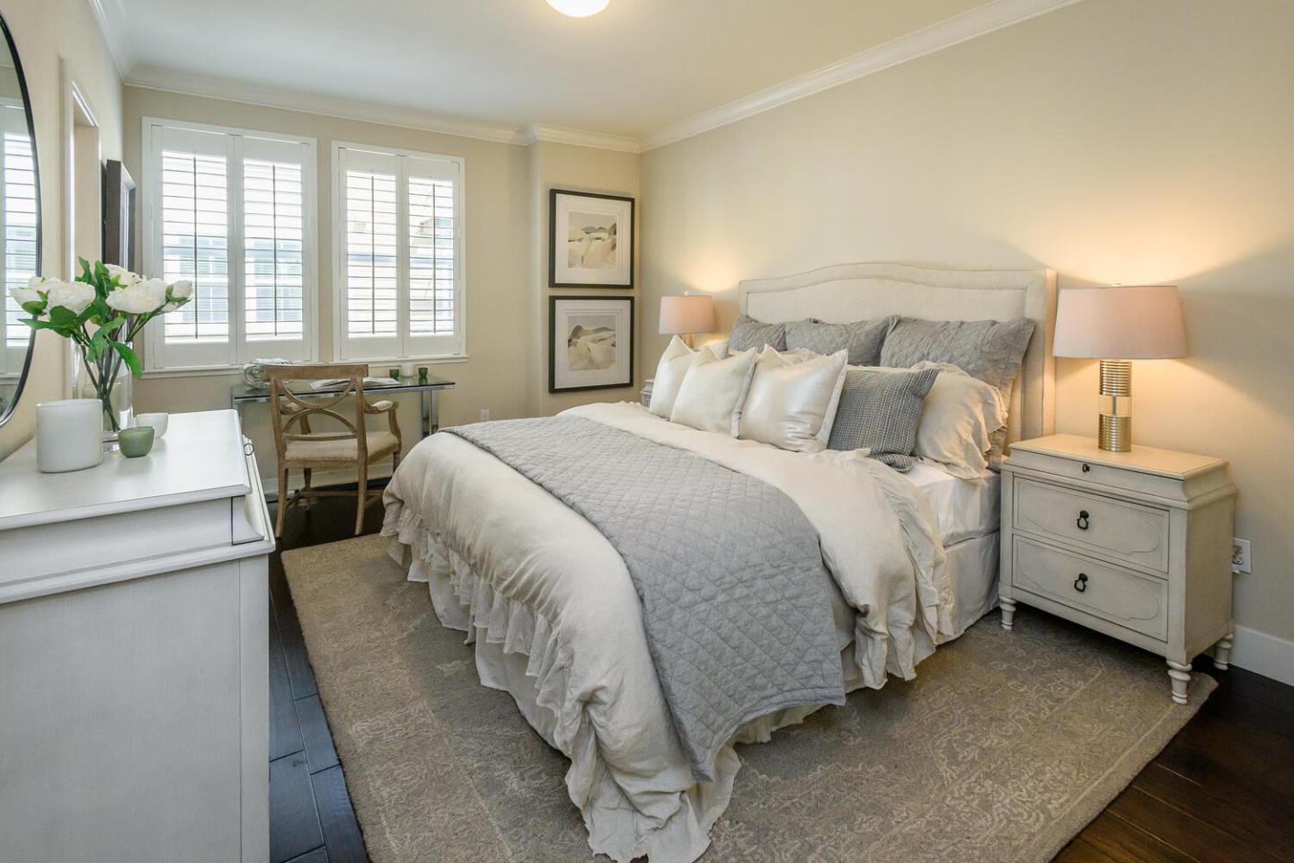 432 Landeros Drive San Mateo, CA 94403 - Photo 12 of 26 a bed room with a bed and a table