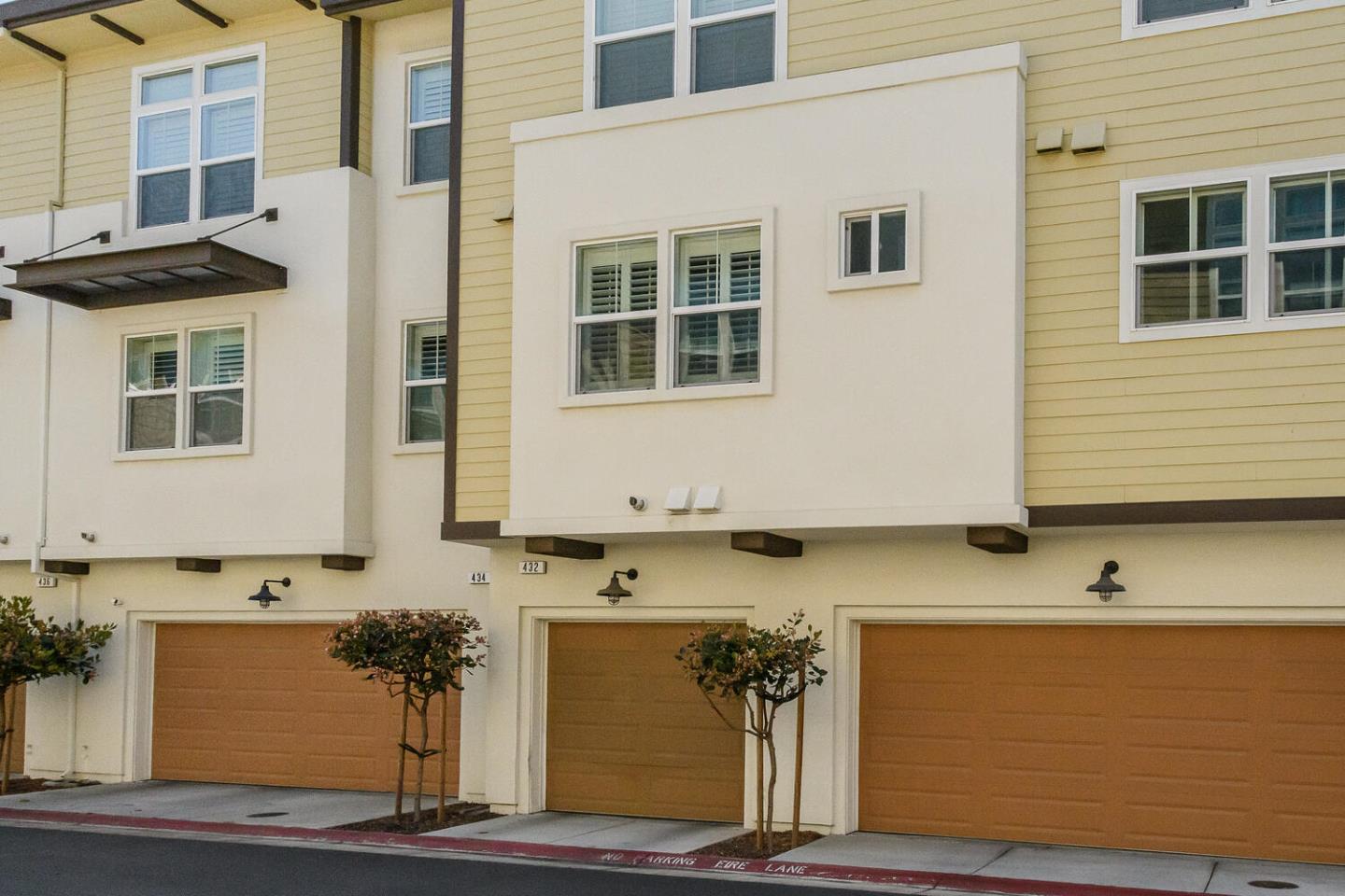 432 Landeros Drive San Mateo, CA 94403 - Photo 18 of 26 a front view of a house with a yard
