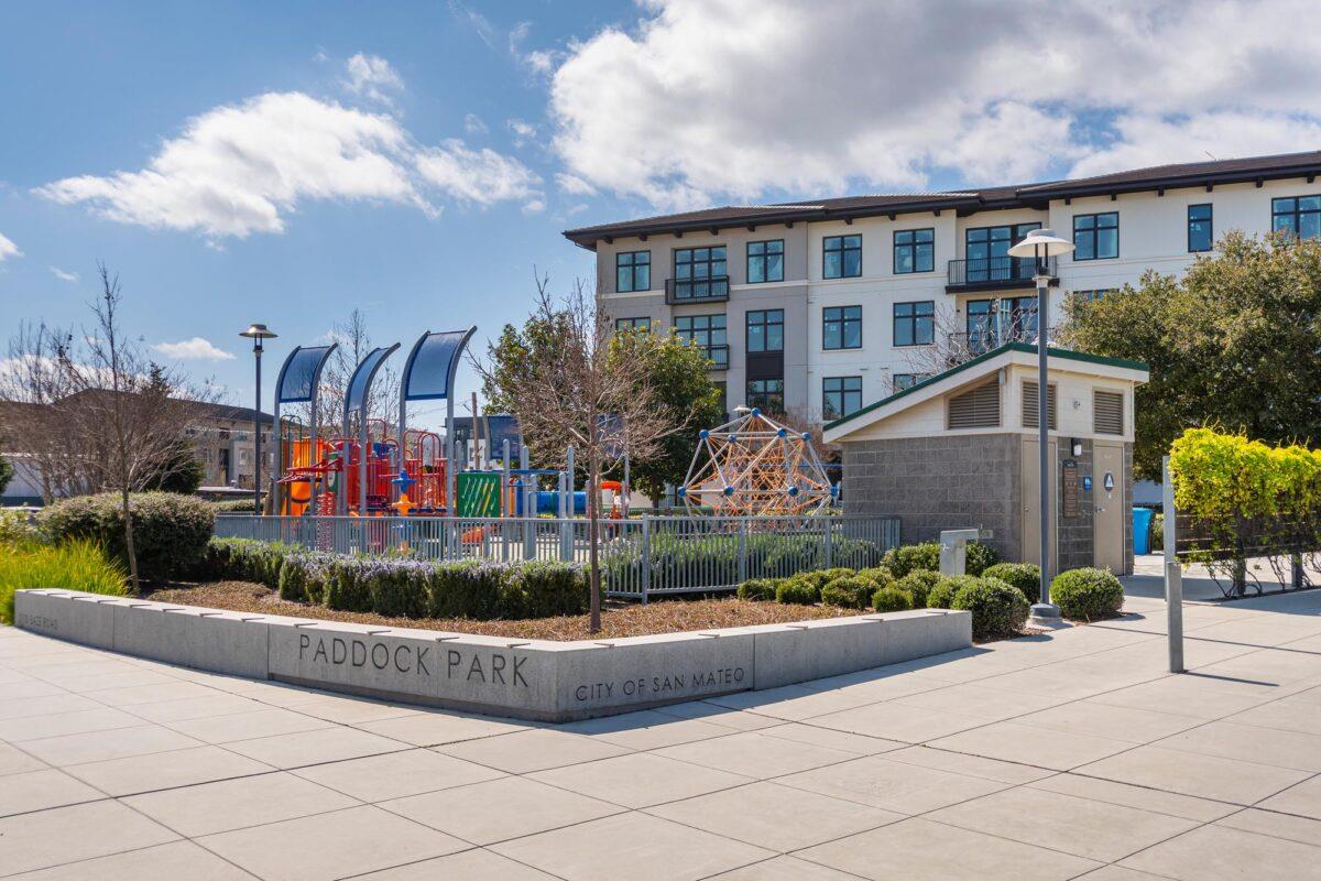 432 Landeros Drive San Mateo, CA 94403 - Photo 20 of 26 a view of a white building among the street and trees