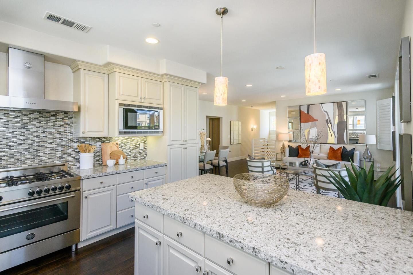 432 Landeros Drive San Mateo, CA 94403 - Photo 9 of 26 a kitchen with sink stove and cabinets