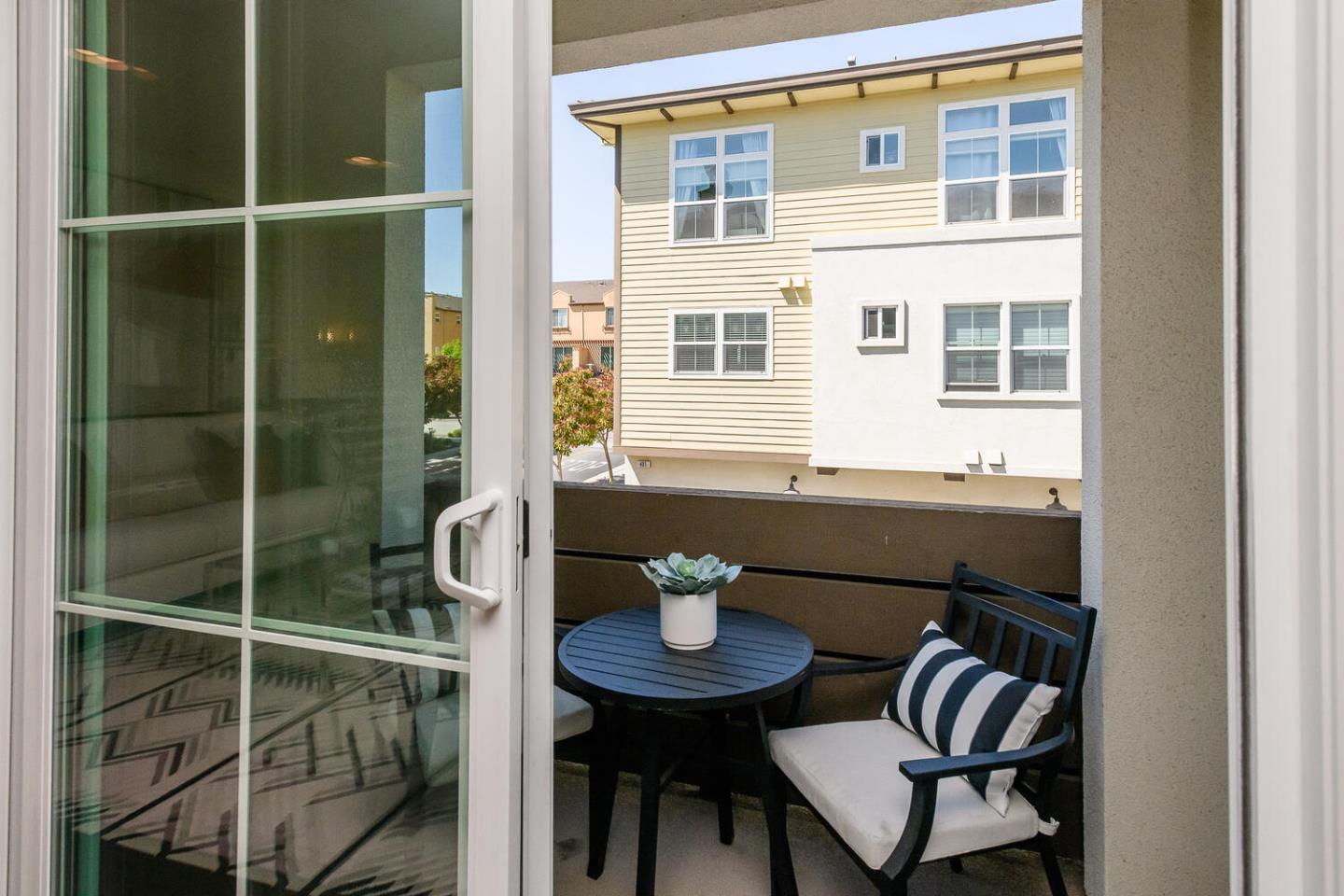 432 Landeros Drive San Mateo, CA 94403 - Photo 10 of 26 a view of a dining room with furniture and window