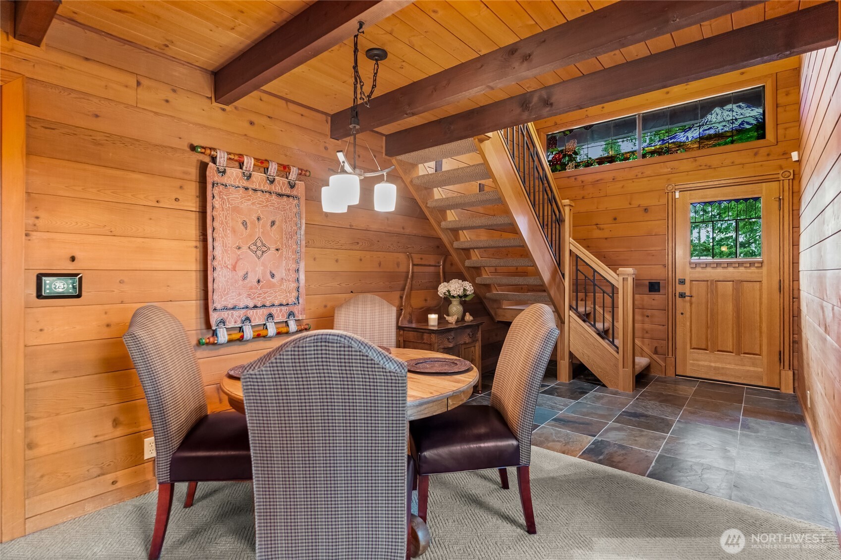 29622 48th Avenue South Roy, WA 98580 - Photo 5 of 38 a view of a patio with table and chairs with wooden floor and fence