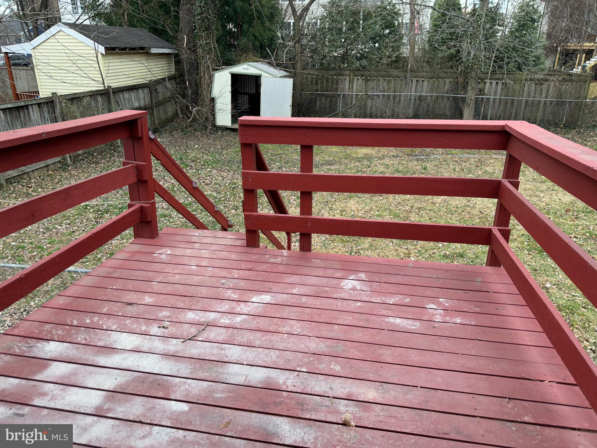 2917 Chain Bridge Road Oakton, VA 22124 - Photo 6 of 11 Charming deck overlooking a spacious yard.