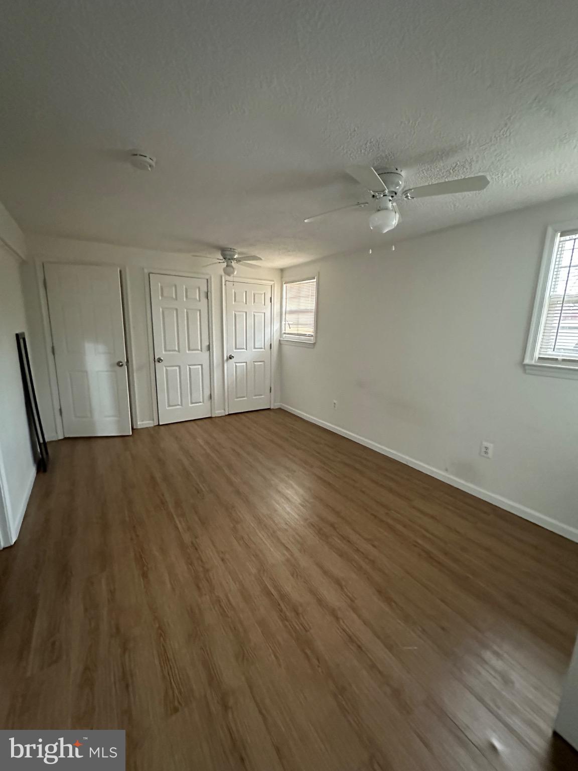 2917 Chain Bridge Road Oakton, VA 22124 - Photo 10 of 11 Spacious room with natural light and charm.