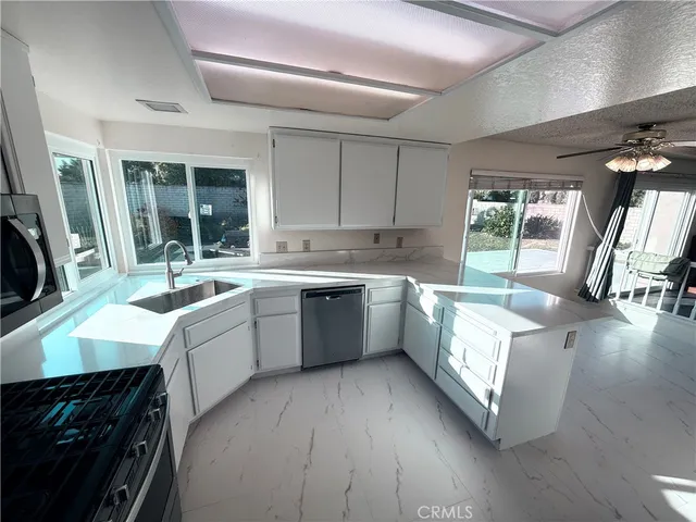 a view of balcony with furniture