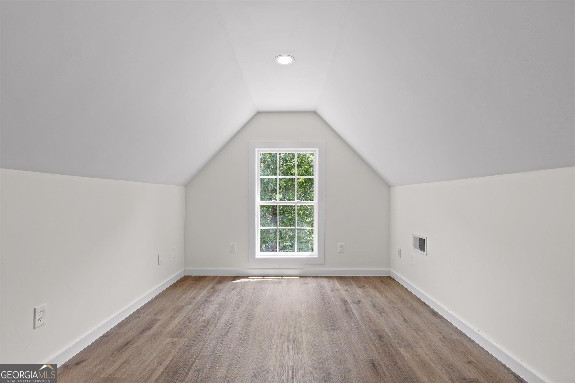506 Condra Road Ringgold, GA 30736 - Photo 24 of 27 an empty room with wooden floor and windows