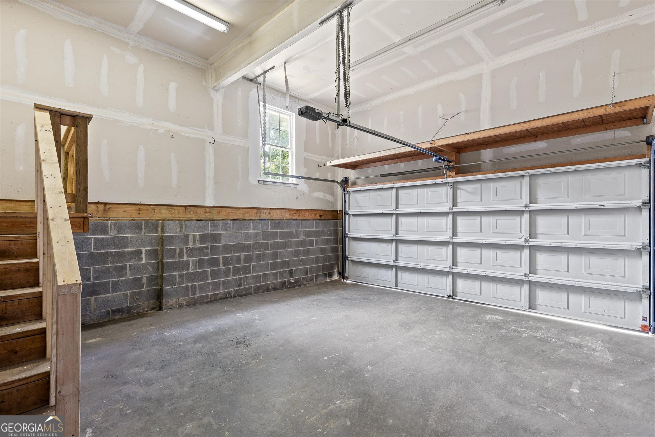 506 Condra Road Ringgold, GA 30736 - Photo 26 of 27 a view of an empty room with a staircase
