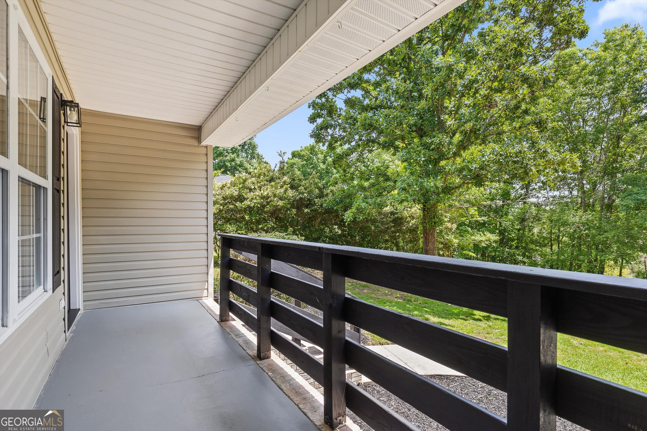 506 Condra Road Ringgold, GA 30736 - Photo 27 of 27 a view of a wooden bench in a balcony