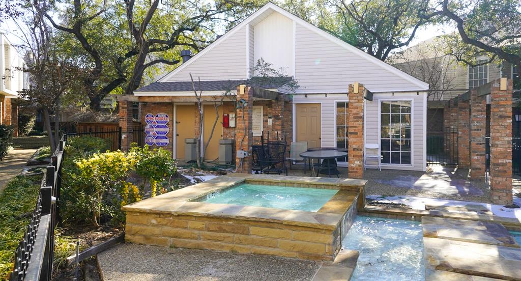 12921 Abrams Road, Unit 505 Dallas, TX 75243 - Photo 21 of 24 Clubhouse featuring a patio area and an in-ground hot tub