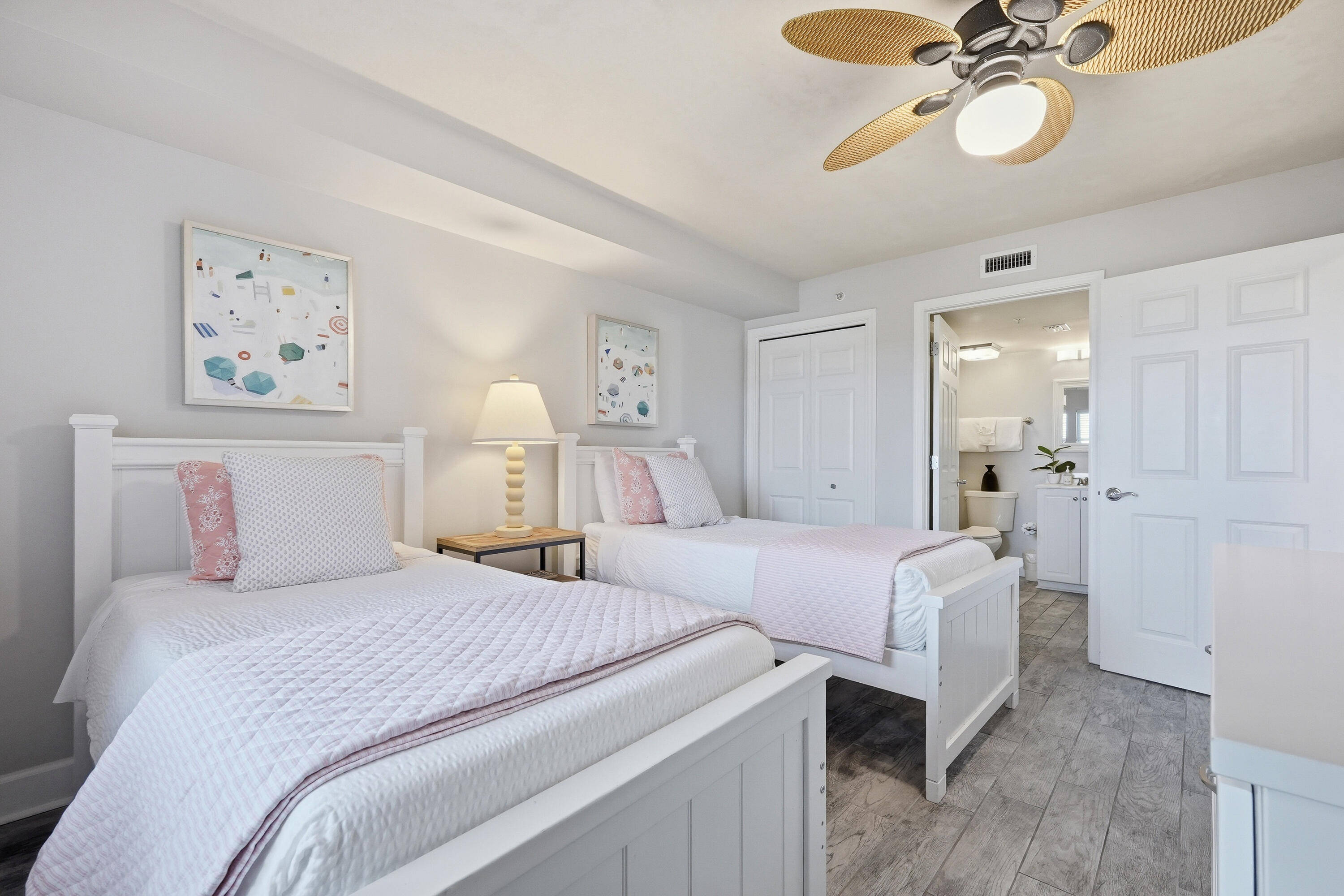 866 Santa Rosa Boulevard, Unit 506 Fort Walton Beach, FL 32548 - Photo 21 of 49 a bedroom with a bed and a chandelier