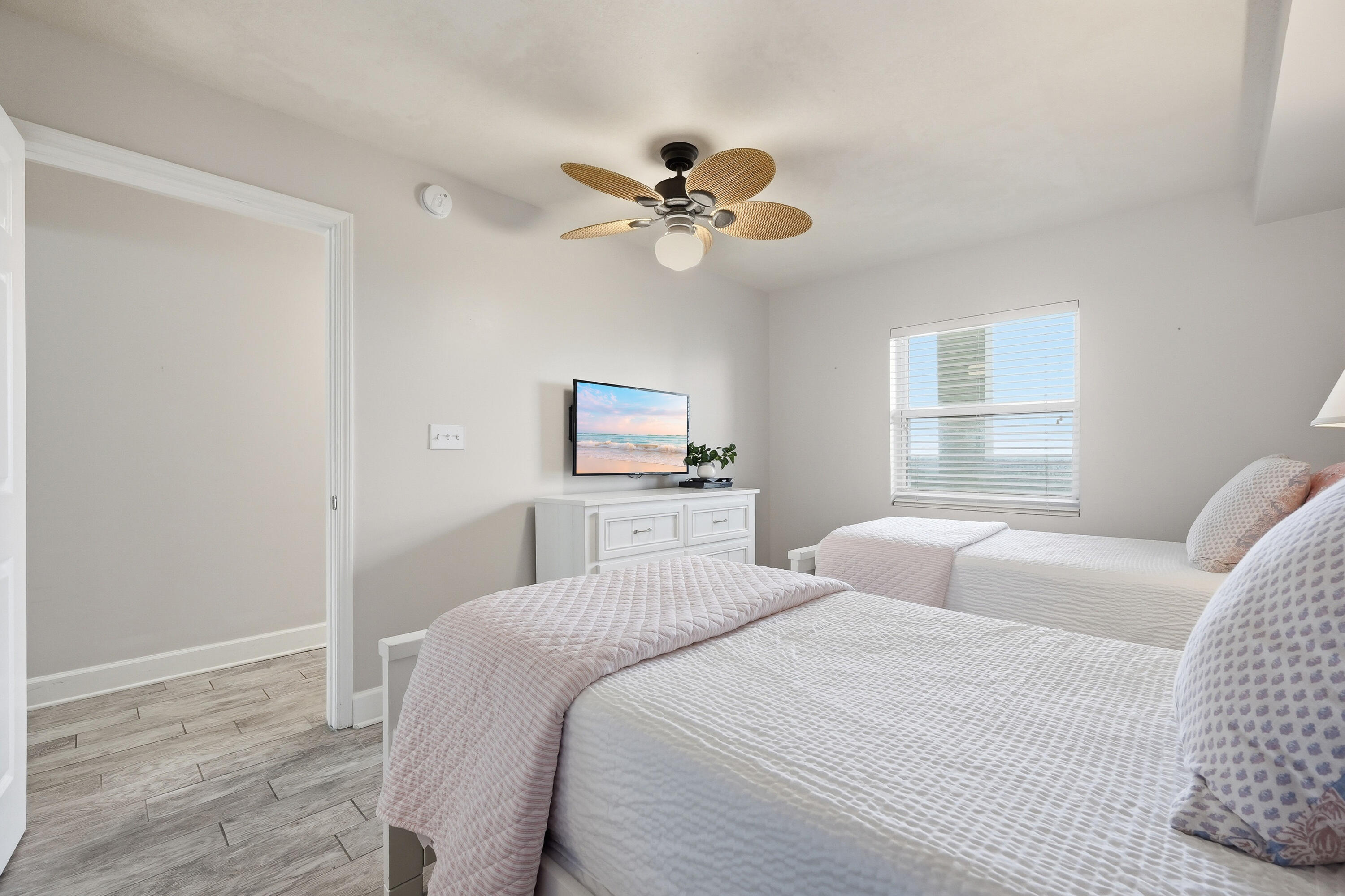 866 Santa Rosa Boulevard, Unit 506 Fort Walton Beach, FL 32548 - Photo 22 of 49 a bedroom with a bed and a window