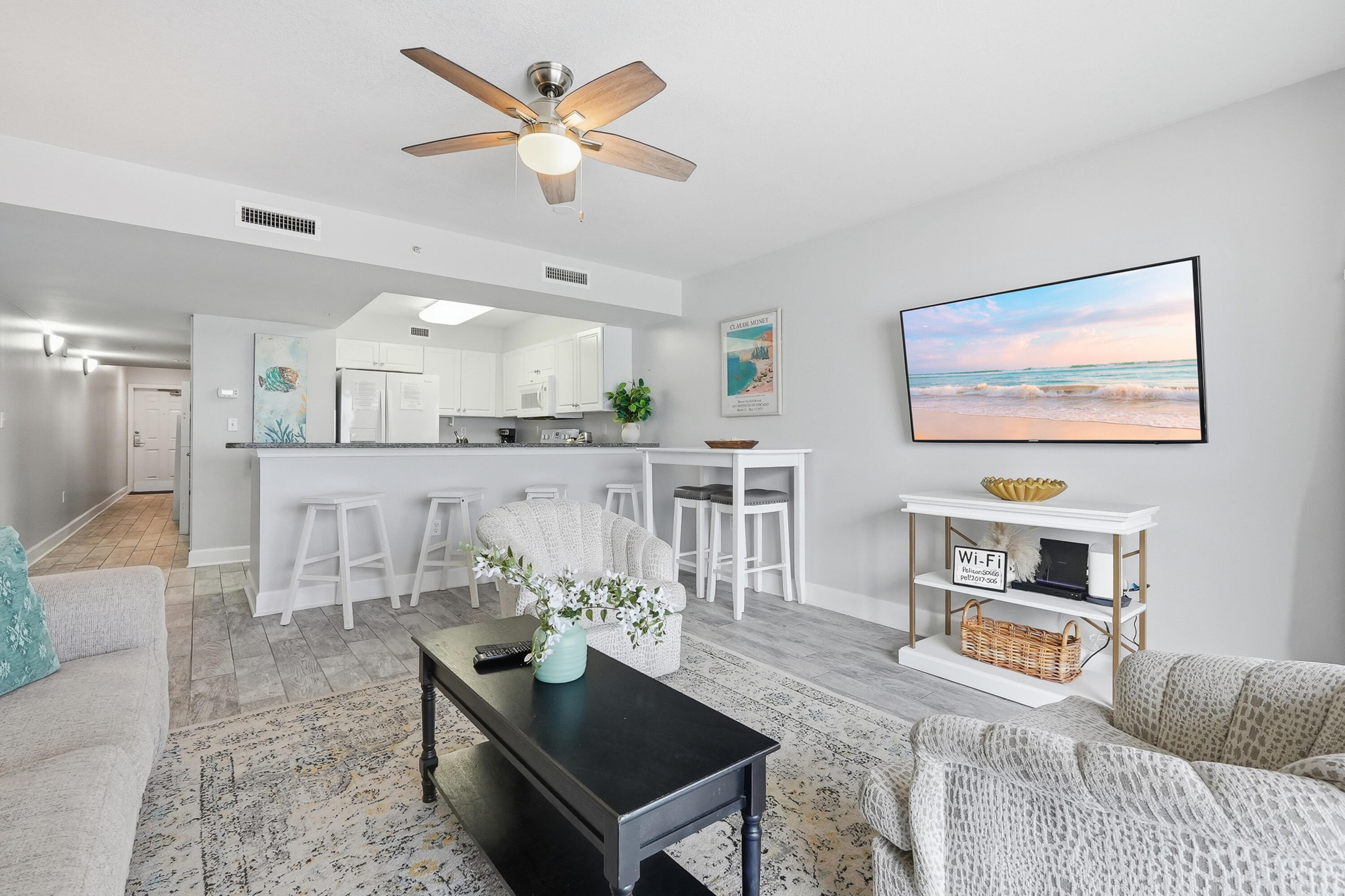 866 Santa Rosa Boulevard, Unit 506 Fort Walton Beach, FL 32548 - Photo 3 of 49 a living room with furniture and a table