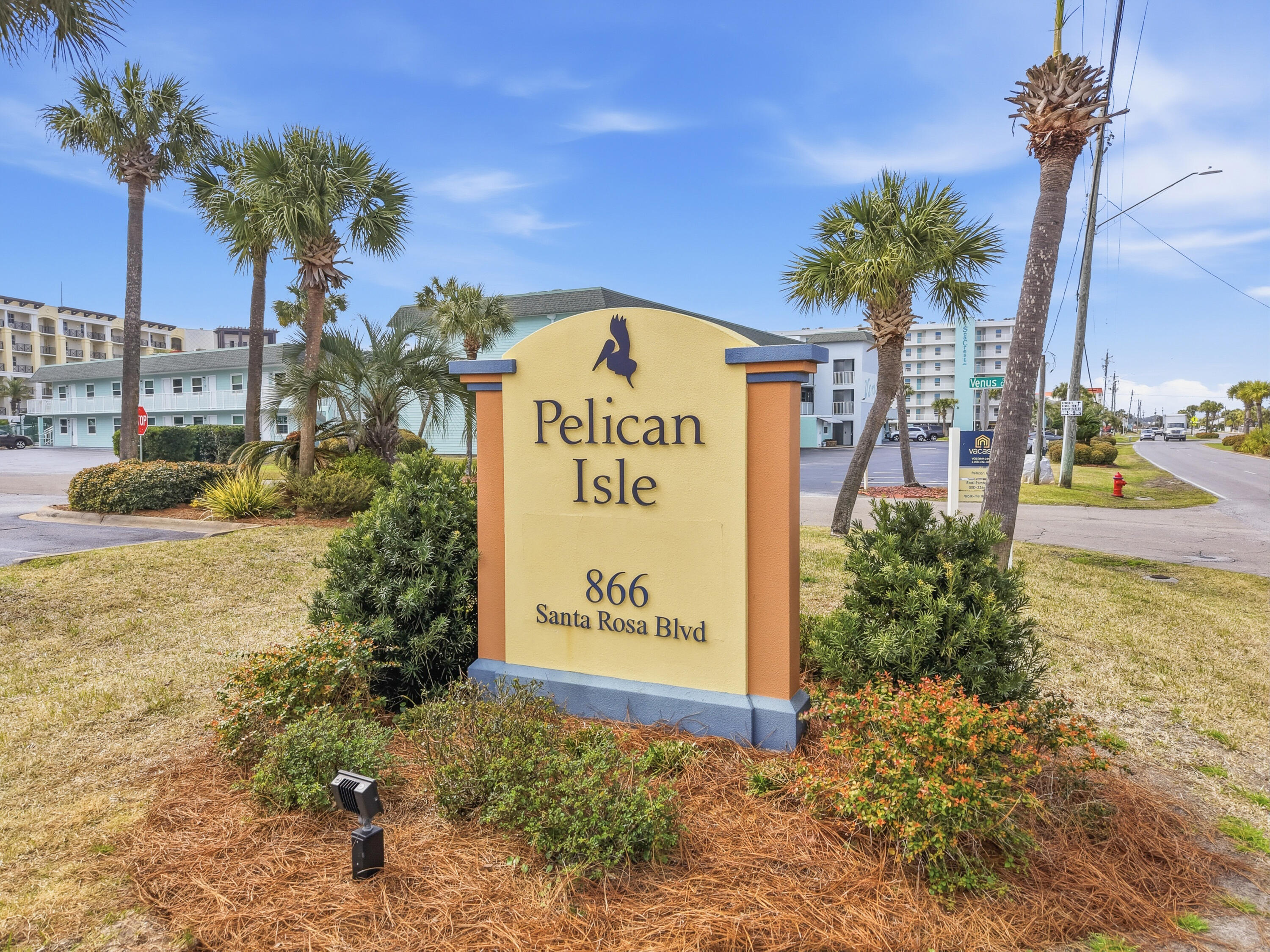 866 Santa Rosa Boulevard, Unit 506 Fort Walton Beach, FL 32548 - Photo 36 of 49 a sign on the side of the road