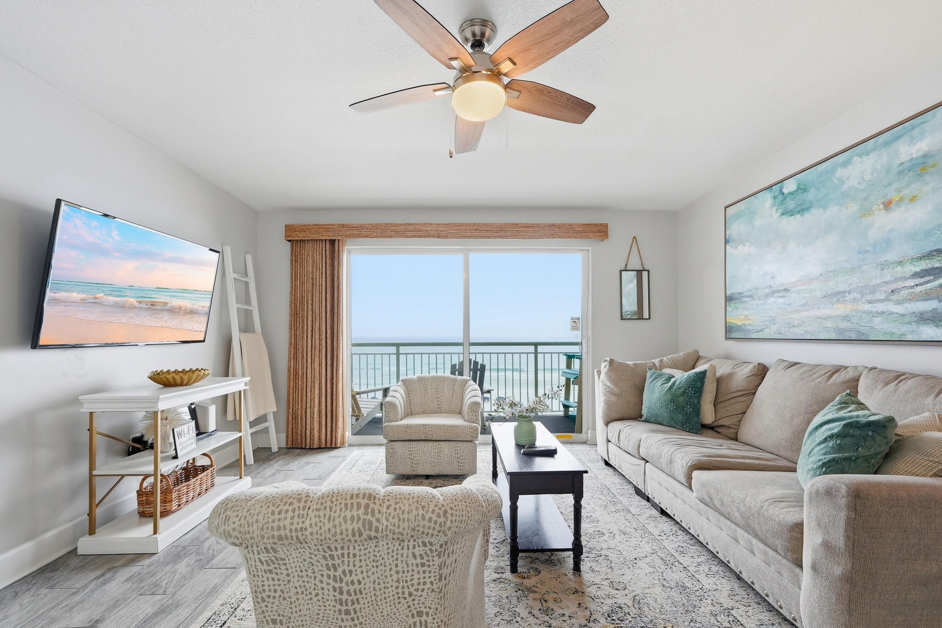 866 Santa Rosa Boulevard, Unit 506 Fort Walton Beach, FL 32548 - Photo 5 of 49 a living room with furniture and a large window