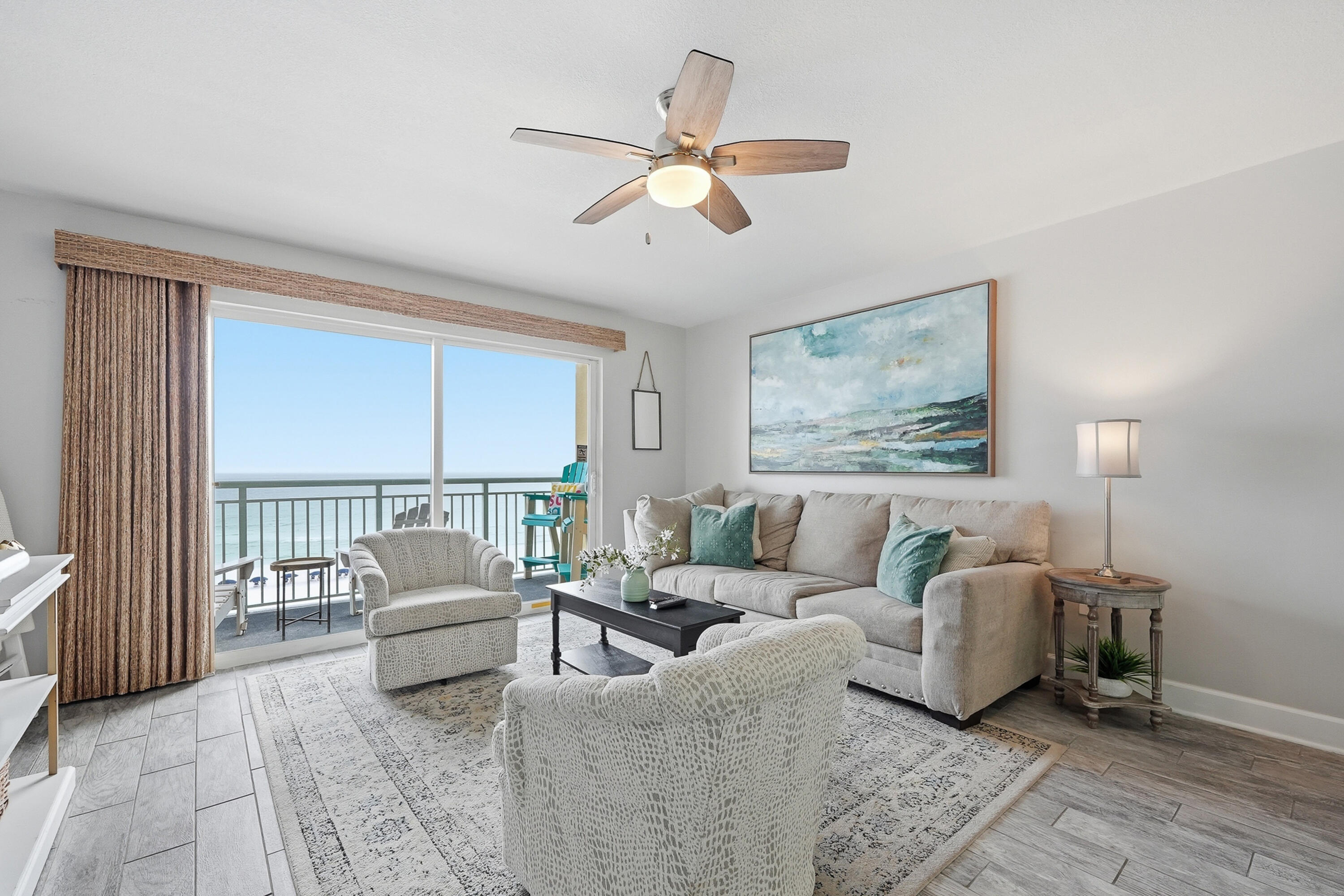 866 Santa Rosa Boulevard, Unit 506 Fort Walton Beach, FL 32548 - Photo 6 of 49 a living room with furniture and large windows