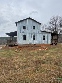 2417 Salem Church Road Bostic, NC 28018 - Photo 12 of 22 a big house with a big yard and large trees