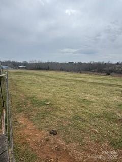 2417 Salem Church Road Bostic, NC 28018 - Photo 15 of 22 a view of a lake and sunset