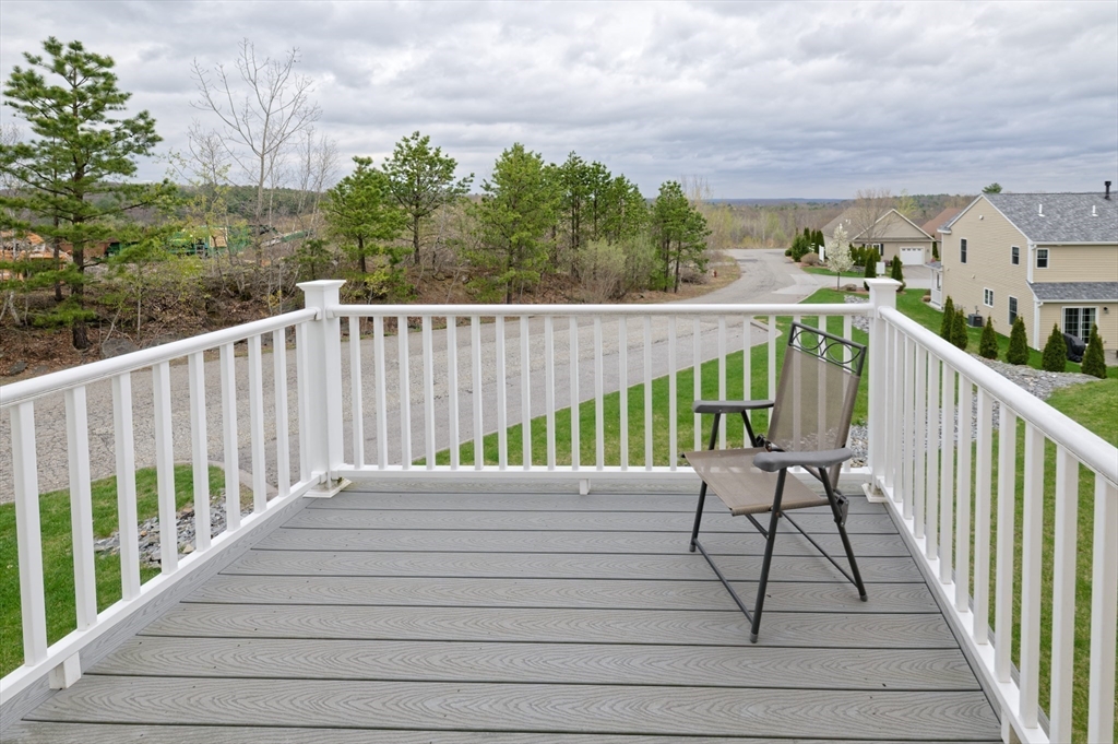 1202 Hazelwood Way, Unit 1202 Clinton, MA 01510 - Photo 15 of 38 a view of stairs and wooden floor