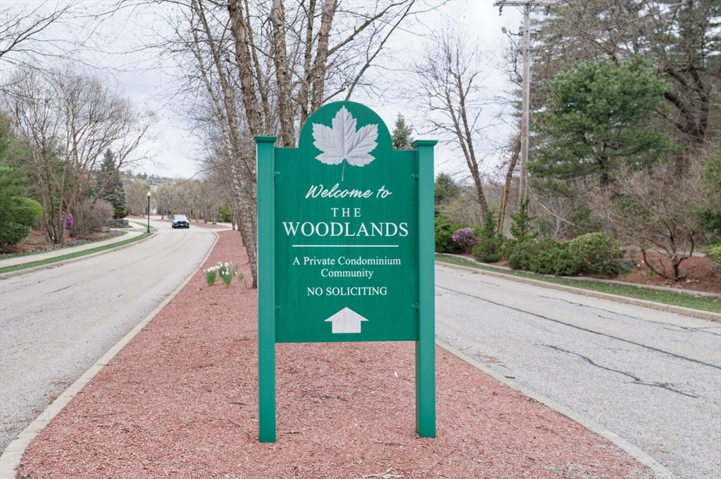 1202 Hazelwood Way, Unit 1202 Clinton, MA 01510 - Photo 2 of 38 a sign that is on the side of the road
