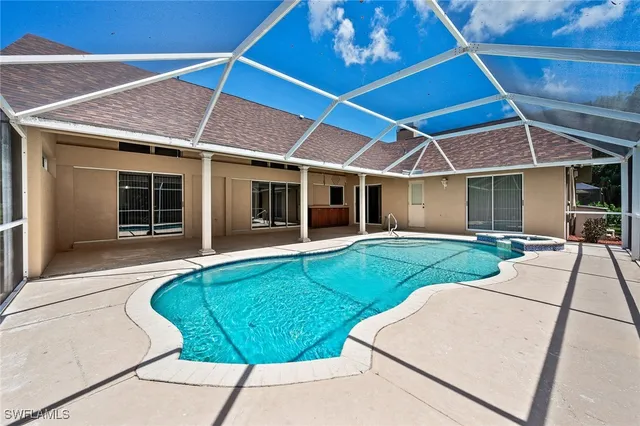 a view of a house with a swimming pool