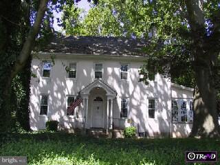 1016 Edinburg Road Hamilton, NJ 08690 - Photo 1 of 4 front view of house with a yard