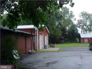 1016 Edinburg Road Hamilton, NJ 08690 - Photo 3 of 4 a view of a house with a yard and tree s