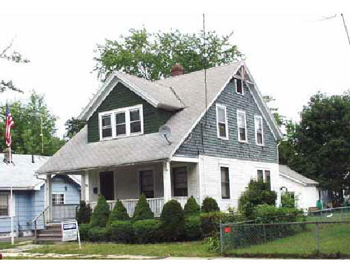 187 Jasper Street Springfield, MA 01109 - Photo 1 of 1 a front view of a house with a yard
