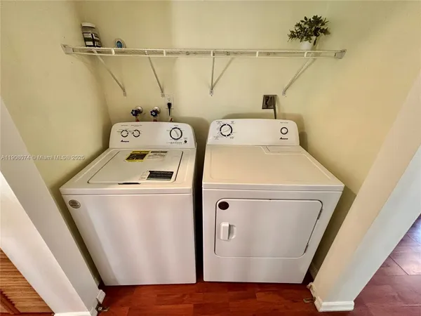a utility room with dryer and washer