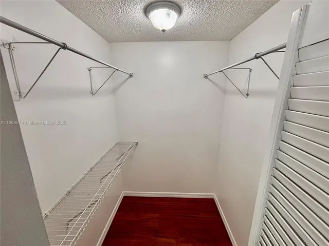 a bathroom with a sink and shower